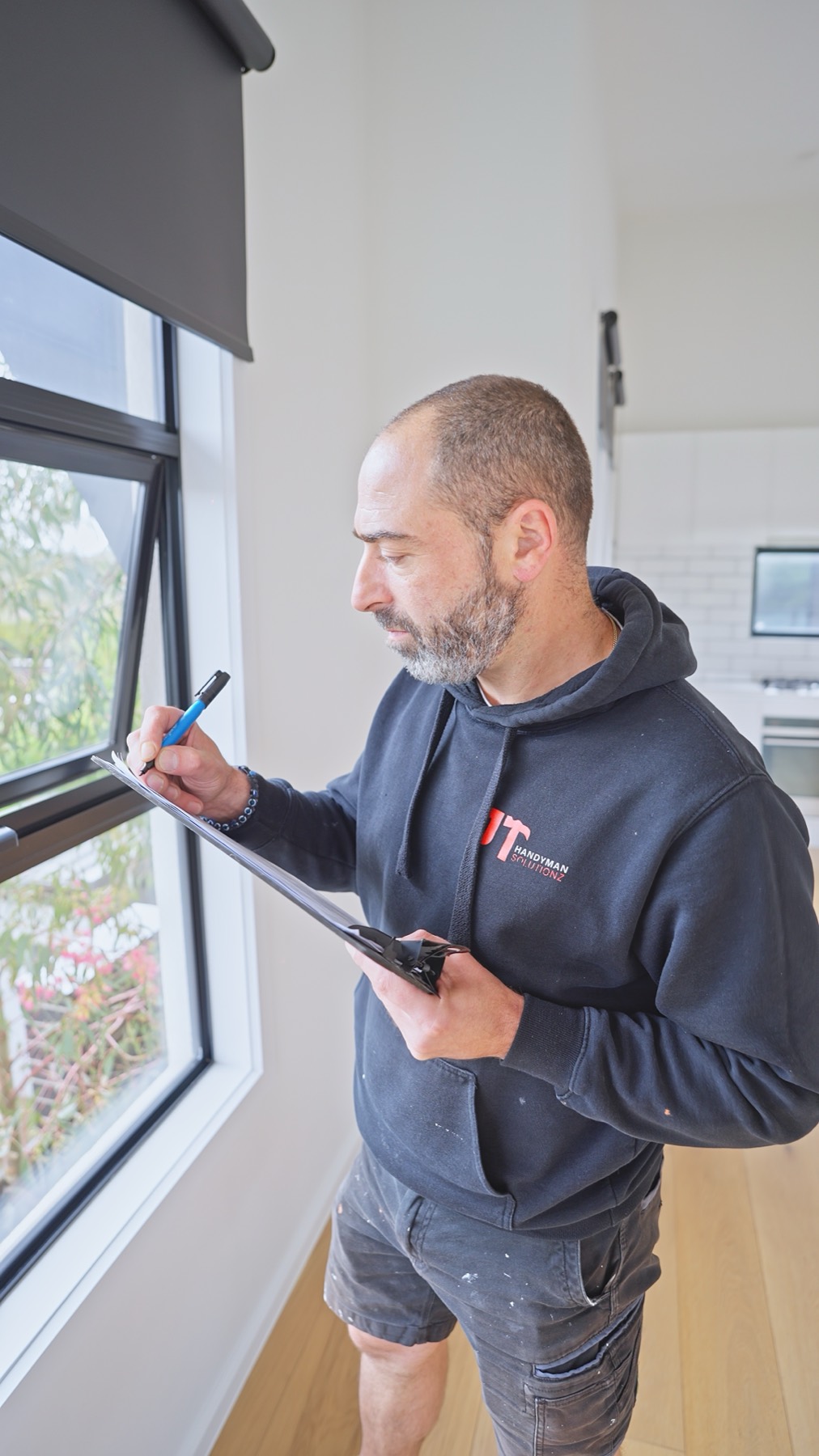 A property being inspected against the rental minimum standards